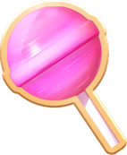 Búa Kẹo Mút trong Candy Crush Friends Saga: Một cây kẹo mút hồng bóng với thiết kế xoáy nhẹ trên một cây gậy vàng, mang lại vẻ ngoài kẹo đơn giản nhưng cổ điển
