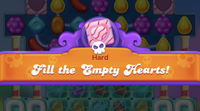 Banner om een Moeilijk Level van de Vul de Lege Harten spelmodus in Candy Crush Friends Saga aan te kondigen
