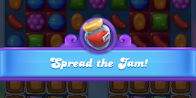 Banner som annonserer et Spre syltetøy-nivå i Candy Crush Friends Saga