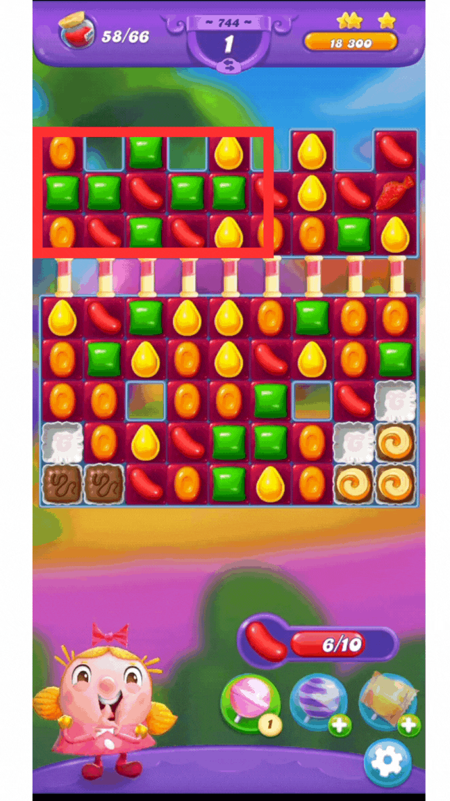 ภาพ GIF แสดงวิธีที่ผู้เล่นสร้าง Coloring Candy สีเขียวใน Candy Crush Friends Saga โดยการจับคู่ลูกกวาด 7 เม็ดเป็นรูปตัว “T” แบบพิเศษ
